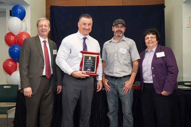 Gary Lent and Ron Rafferty of China Gear Motions accept an award at the PEB Annual Awards 2019